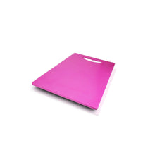 Plastic cutting board for kitchen use, ideal for chopping and slicing.